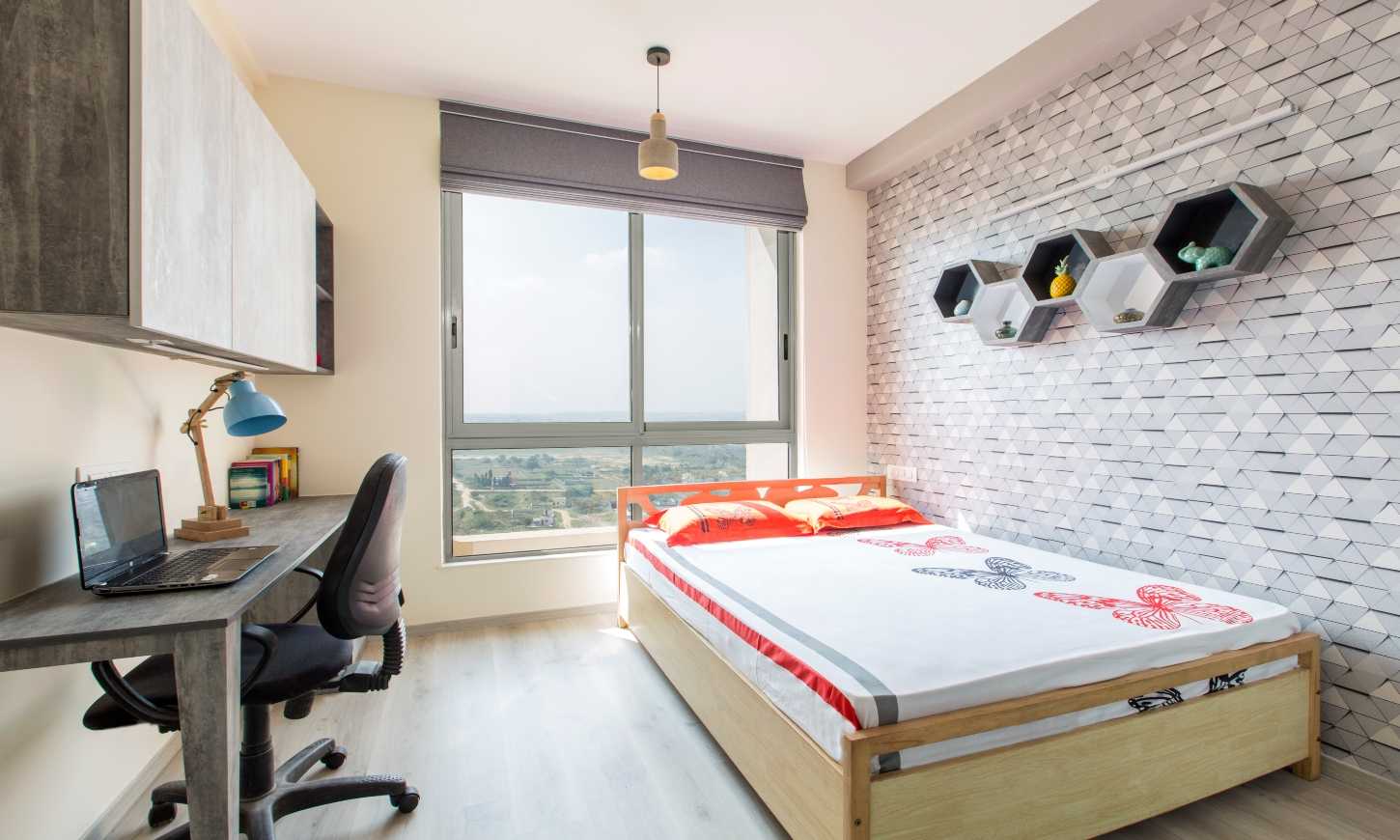 a guest bedroom designed by residential interior designers in pune